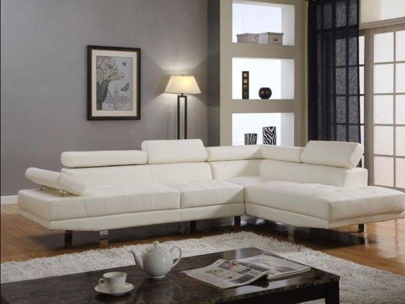 2PC Leather Sectional w/adjustable head rest